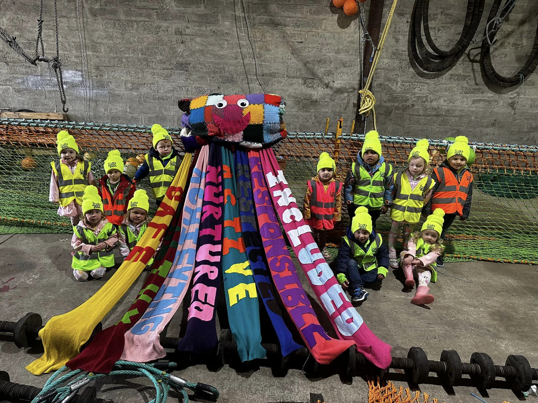 A giant knitted CAL with a group of young children
